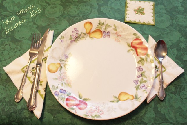 Christmas dinner place setting. No food, just diehs. 