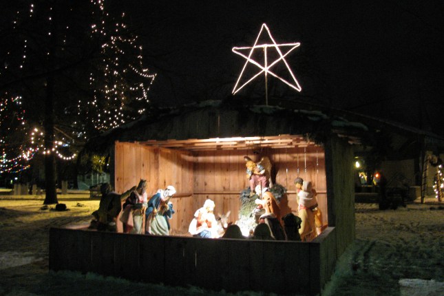 The Manger with the Nativity Story in Bronson Park, Kalamazoo - at night.