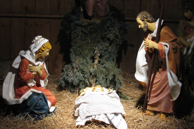A close-up of the Christ Child in the Nativity at Bronson Park in Kalamazoo - Jesus, Mary, and Joseph.