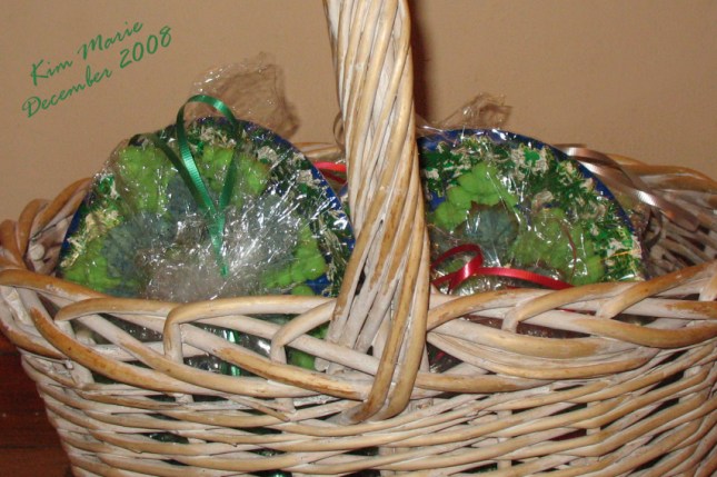 Basket of press cookies - green christmas trees - wrapped and ready for a cookie exchange back in 2008.